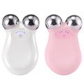 White and pink handheld massagers with silver heads on a white background